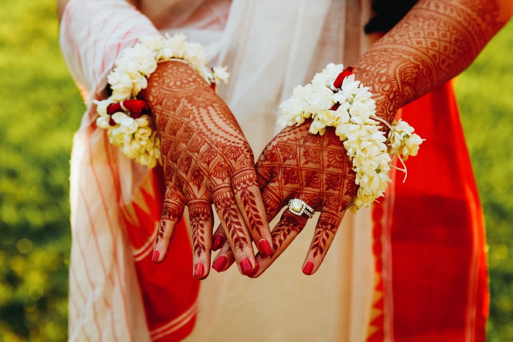 Bridal hands with beautiful organic henna